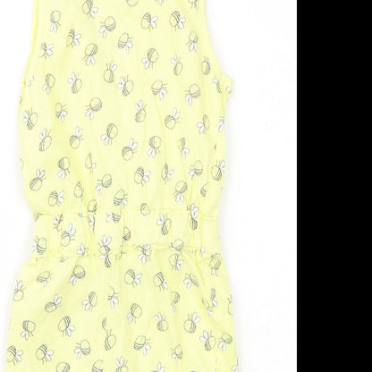 Brand and care label for Young Dimension girls’ yellow playsuit one-piece, size 2, years