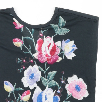 Close-up detail of Nutmeg women’s multicoloured floral basic t-shirt, size UK 8