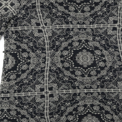 Brand and care label for Atmosphere women’s black fair isle a-line, size UK 10