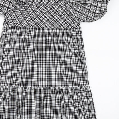 Brand and care label for Papaya women’s black check shift, size UK 8