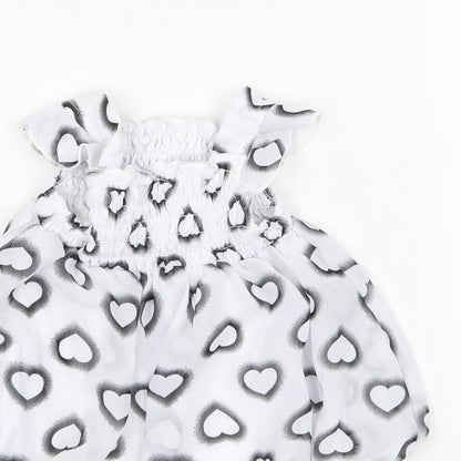 Close-up detail of bon beb girls’ grey animal print a-line, size 6-9, months