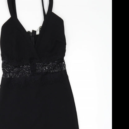 Close-up detail of Miss Selfridge women’s black mini, size UK 8