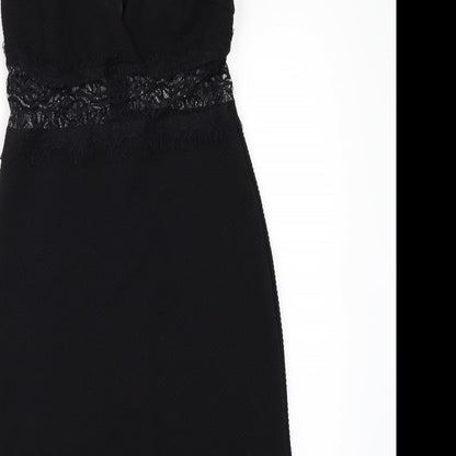 Brand and care label for Miss Selfridge women’s black mini, size UK 8