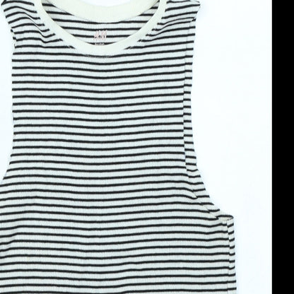 Close-up detail of H&M girls’ black striped basic tank, size 7-8, years
