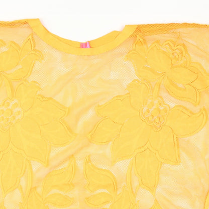 Close-up detail of River Island women’s orange floral basic tank, size S
