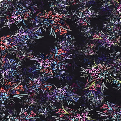 Brand and care label for H&M women’s black floral basic blouse, size UK 14