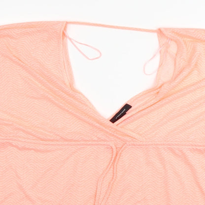 Close-up detail of Atmosphere women’s orange basic t-shirt, size L
