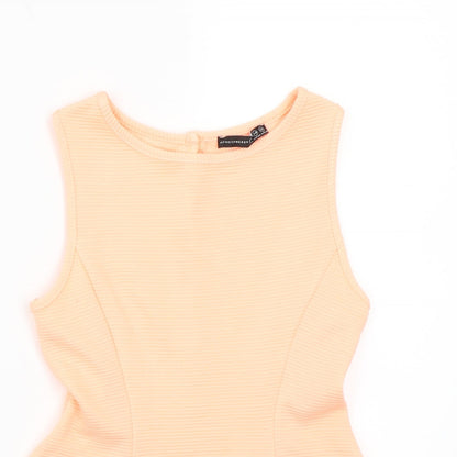 Close-up detail of Primark women’s orange basic t-shirt, size UK 6