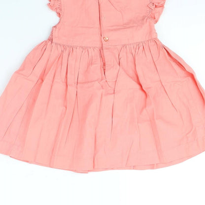 Brand and care label for M&Co girls’ pink fit & flare, size 12, months