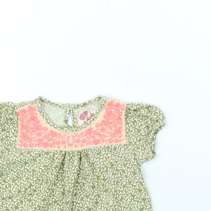 Close-up detail of Next girls’ green basic blouse, size 6-9, months