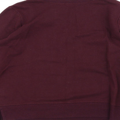 Brand and care label for Gap women’s purple jumper, size M