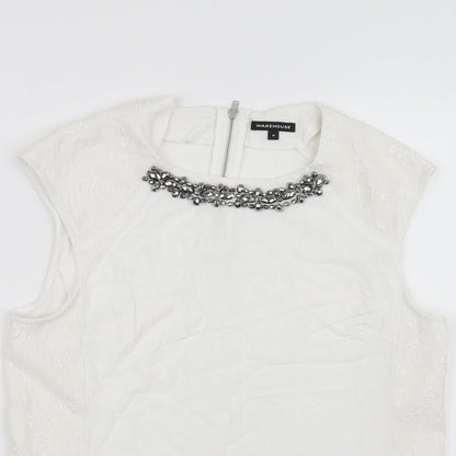 Close-up detail of Warehouse women’s white basic tank, size M