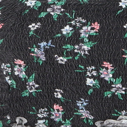 Brand and care label for Primark women’s black floral basic blouse, size UK 10