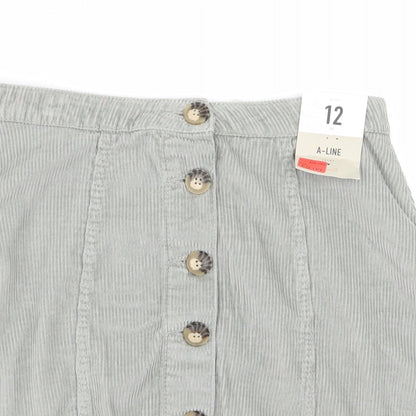 Close-up detail of Primark women’s green straight & pencil set, size UK 12
