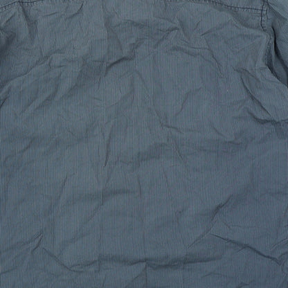 Brand and care label for Denim Seventy3 men’s blue striped button-up, size L