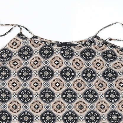Close-up detail of New Look women’s beige geometric camisole blouse, size UK 8