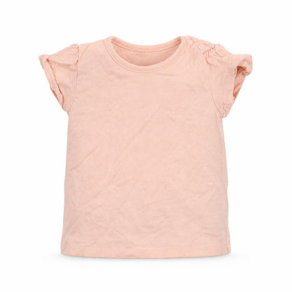 Front view of Nutmeg girls’ pink basic t-shirt, size 3-6, months