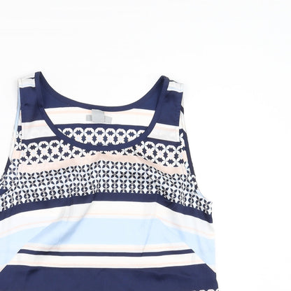 Close-up detail of H&M women’s blue geometric basic blouse, size UK 8