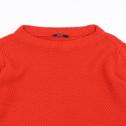 Close-up detail of George men’s red jumper