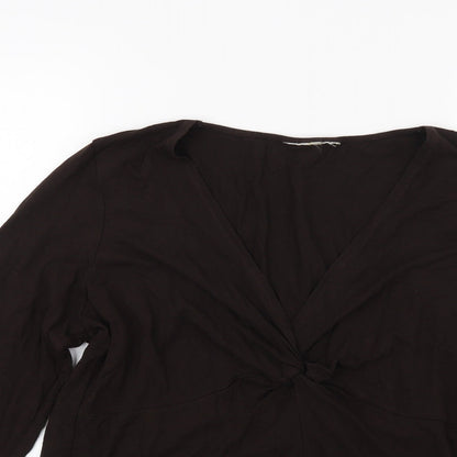 Close-up detail of Preworn women’s brown tunic blouse, size UK 16