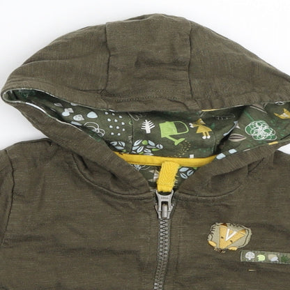 Close-up detail of Tu boys’ green jacket, size 0-3, months