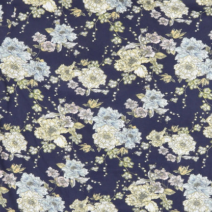 Brand and care label for H&M women’s blue floral basic blouse, size UK 8