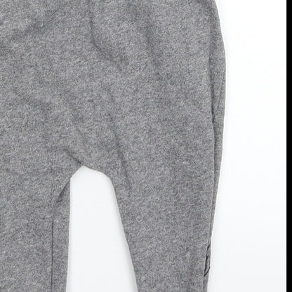 Brand and care label for Disney Baby Grey sweatpants, size 9-12, Months