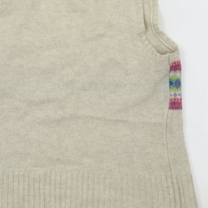 Brand and care label for Primark girls’ beige basic tank, size 12, years