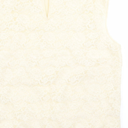 Brand and care label for St Michael women’s beige basic blouse, size UK 12
