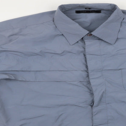 Close-up detail of edge men’s blue button-up, size XL