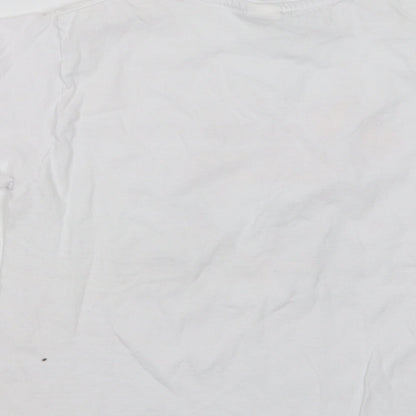 Brand and care label for Planet 2000 girls’ white basic t-shirt, size 10, years