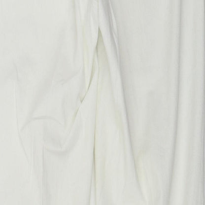 Brand and care label for C&A women’s white trousers, size UK 30, in, 27-inch leg