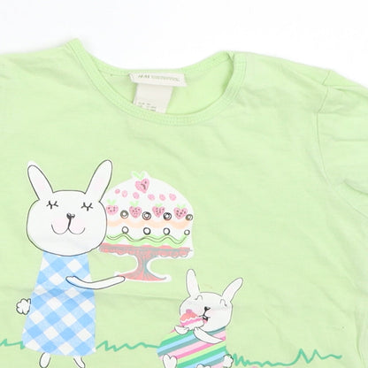 Close-up detail of H&M girls’ green basic t-shirt, size 12-18, months