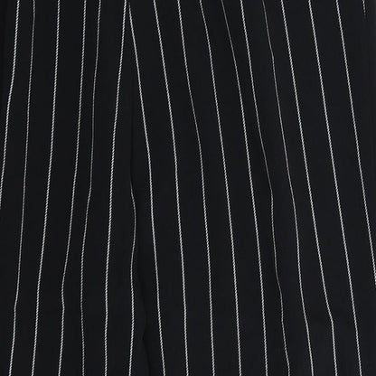 Brand and care label for Divided women’s black striped trousers, size UK 10, 25-inch leg