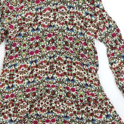 Brand and care label for Caters girls’ multicoloured floral fit & flare, size 12, months