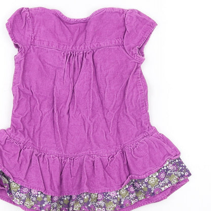 Brand and care label for Cherokee girls’ purple a-line, size 12-18, months