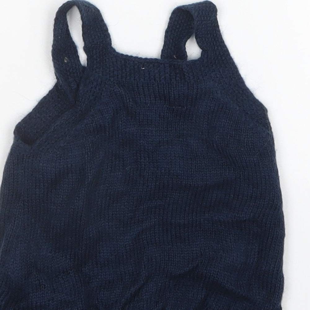 Brand and care label for F&F girls’ blue knit pinafore/dungaree dress, size 0-3, months