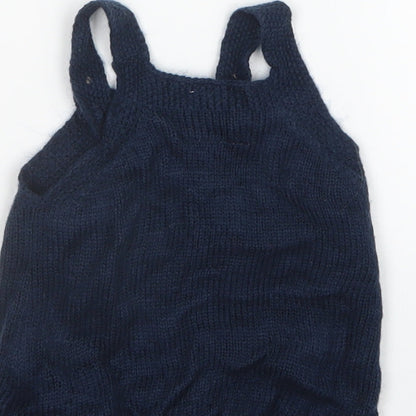 Brand and care label for F&F girls’ blue knit pinafore/dungaree dress, size 0-3, months