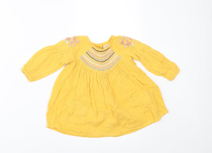 Front view of Next girls’ yellow a-line, size 3-6, months