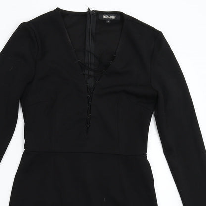 Close-up detail of Missguided women’s black mini, size UK 8