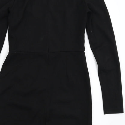 Brand and care label for Missguided women’s black mini, size UK 8