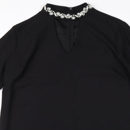 Close-up detail of Papaya women’s black shift, size UK 12