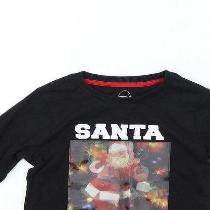 Close-up detail of Matalan girls’ black basic polo, size 4, years - santa