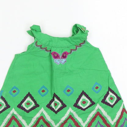 Close-up detail of George girls’ green a-line, size 18, months