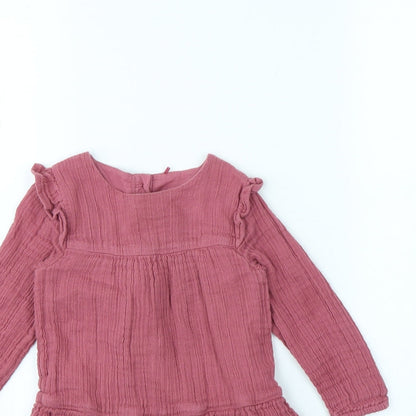Close-up detail of Tu girls’ pink fit & flare, size 18, months