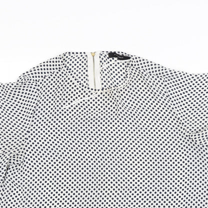 Close-up detail of Atmosphere women’s white basic blouse, size UK 12