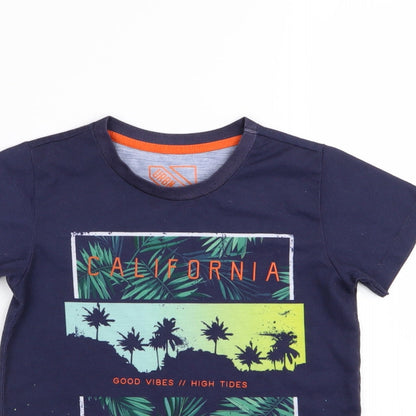 Close-up detail of urban dept boys’ blue basic t-shirt, size 7, years