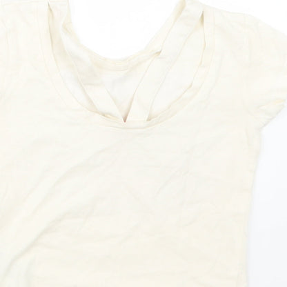 Brand and care label for Billieblush girls’ ivory basic t-shirt, size 4, years