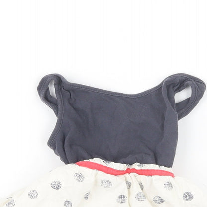 Close-up detail of Gap girls’ grey geometric t-shirt dress, size 18-24, months