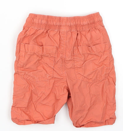Back view of Tu boys’ orange cargo trousers, size 18-24, months